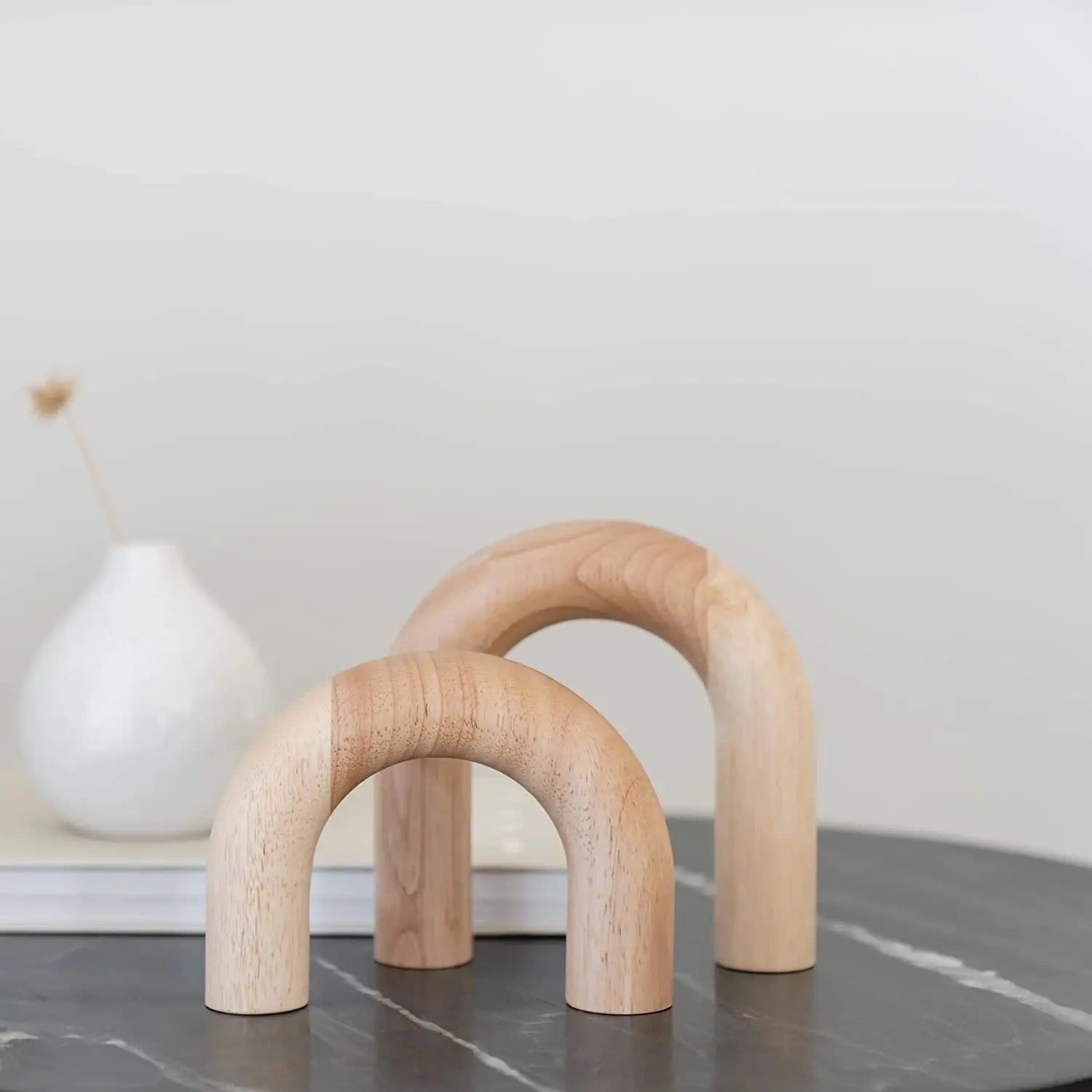 Two wooden decorative arches, perfect for contemporary home styling