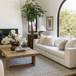 Modern rectangular wood coffee tableElegant living room with a rectangular wood coffee table in natural light